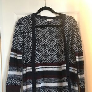 blue white a maroon cardigan